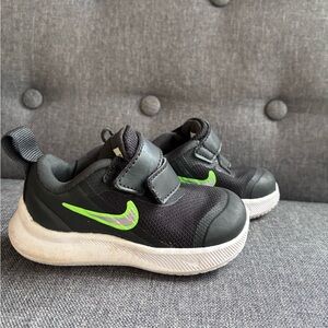 Nike Kids Black Sneakers with Green Accents